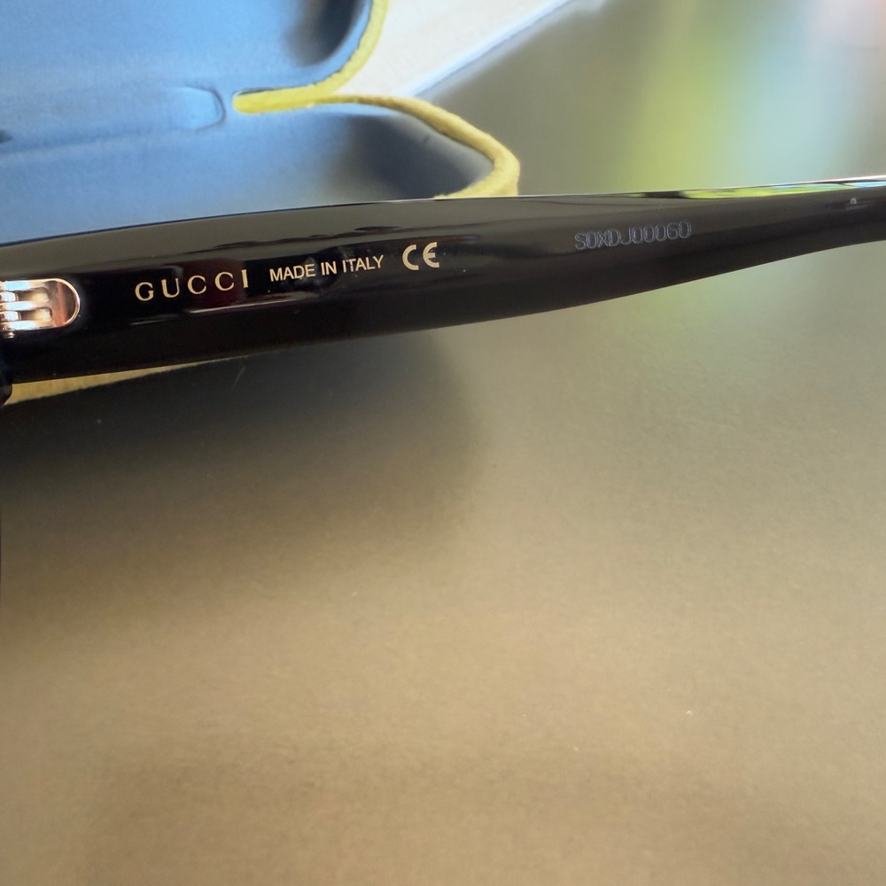Gucci Black Cat-Eye Sunglasses with Gold GG Accents - Picture 5 of 11